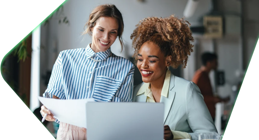 Two women working together